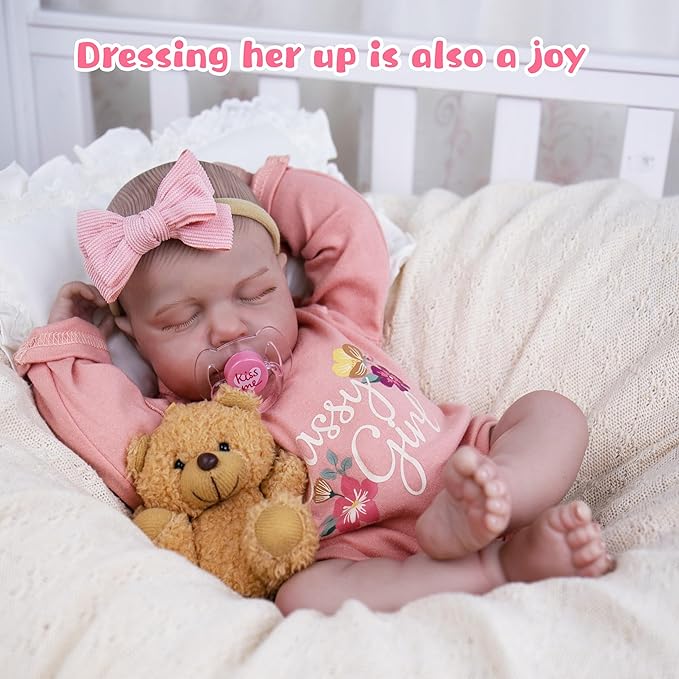 EKOKIZ Realistic Baby Doll, 20-Inch Reborn Baby Doll Girls Soft Cloth Body Newborn Dolls That Look Real, Lovely & Pretty Lifelike Doll with Pink Dress and Toy Accessories for Kids Age 3+