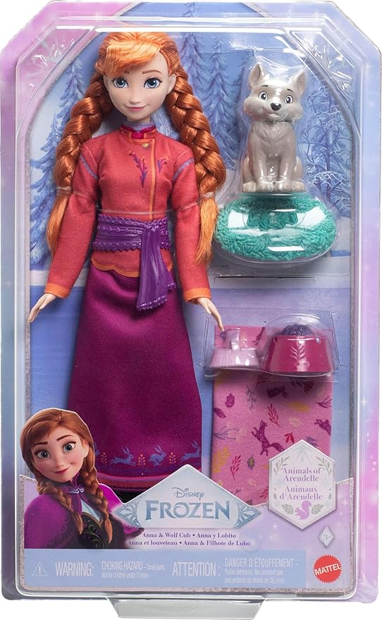 Mattel Disney Frozen Anna Fashion Doll & Wolf Cub Figure with 4 Accessories Including Animal Bed & Blanket, Inspired by Animals of Arendelle