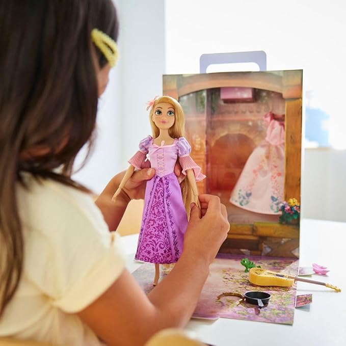 Disney Store Official Rapunzel Story Doll - 11 Inches - Includes Coloring Book and Additional Dress, Princess Doll in Classic Outfit, Disney Princess Toys for Girls