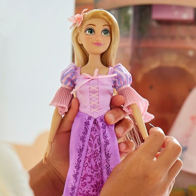 Disney Store Official Rapunzel Story Doll - 11 Inches - Includes Coloring Book and Additional Dress, Princess Doll in Classic Outfit, Disney Princess Toys for Girls