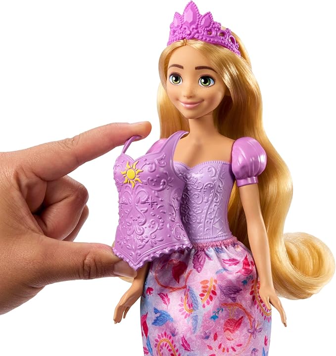 Mattel Disney Princess Toys, Rapunzel Fashion Doll with 2 Looks, 9 Accessories, 2 Snap-On Bodices & 2 Skirts, 2-in-1 Stories Inspired by Disney Tangled