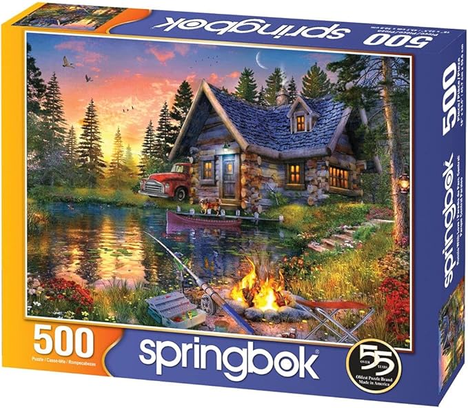 Springbok Sun Kissed Cabin 500 Piece Jigsaw Puzzle for Adults Features a Fishing Cabin by The Lake in a Colorful Illustration