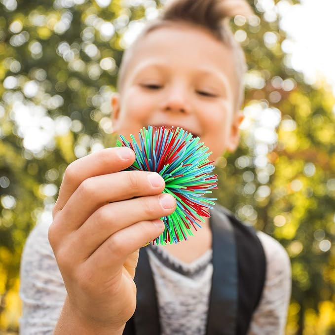 Leinuosen 12 Pieces 12 Pieces Stringy Balls Sensory Stringy Ball Soft Rainbow Pom Bouncy Stress Bags Easter Egg Fillers Basket Stuffers Party Favors Birthday Gifts, Multicolor (2.75 Inch)