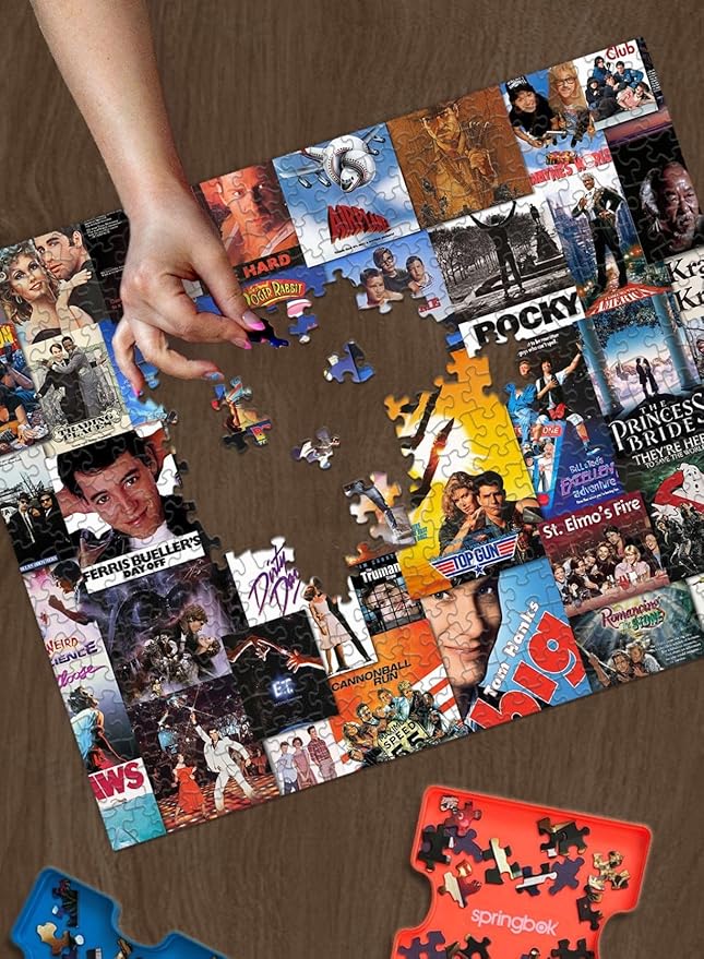 Springbok Going to The Movies 1000 Piece Jigsaw Puzzle for Adults Features a Photo Collage of Posters from Some of America's Favorite Films