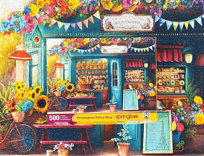Springbok's Boulangerie Pastry Shop 500 Piece Jigsaw Puzzle for Adults Will Have Your Wishing for Pasteries in This Colorful Scene of Baked Goods and Flowers.