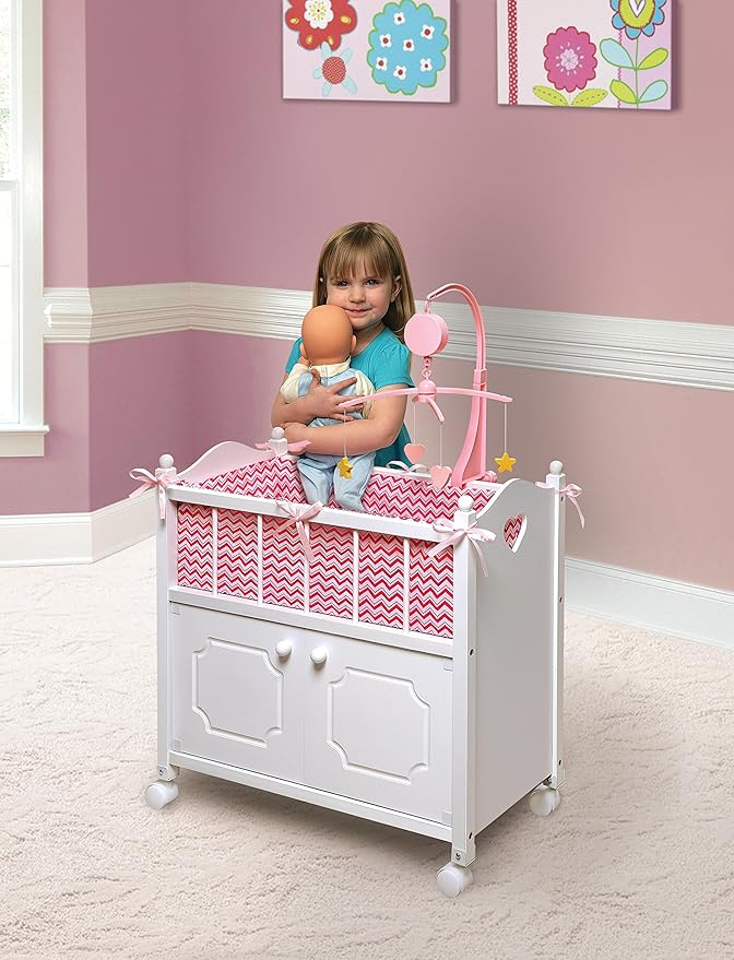 Badger Basket Wooden Toy Doll Bed with Storage, Mobile, and Bedding - Includes Wheels and Free Personalization Kit to Pretend and Play - White with Pink Chevron Fabric